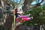 Olivia playing Jane, “Tarzan, here I come”  In Tutu and Lo's back yard